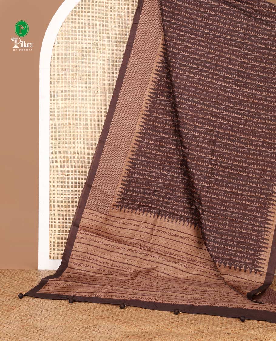 Brown hand block printed semi tussar saree with temple printed border & printed pallu along with printed blouse
