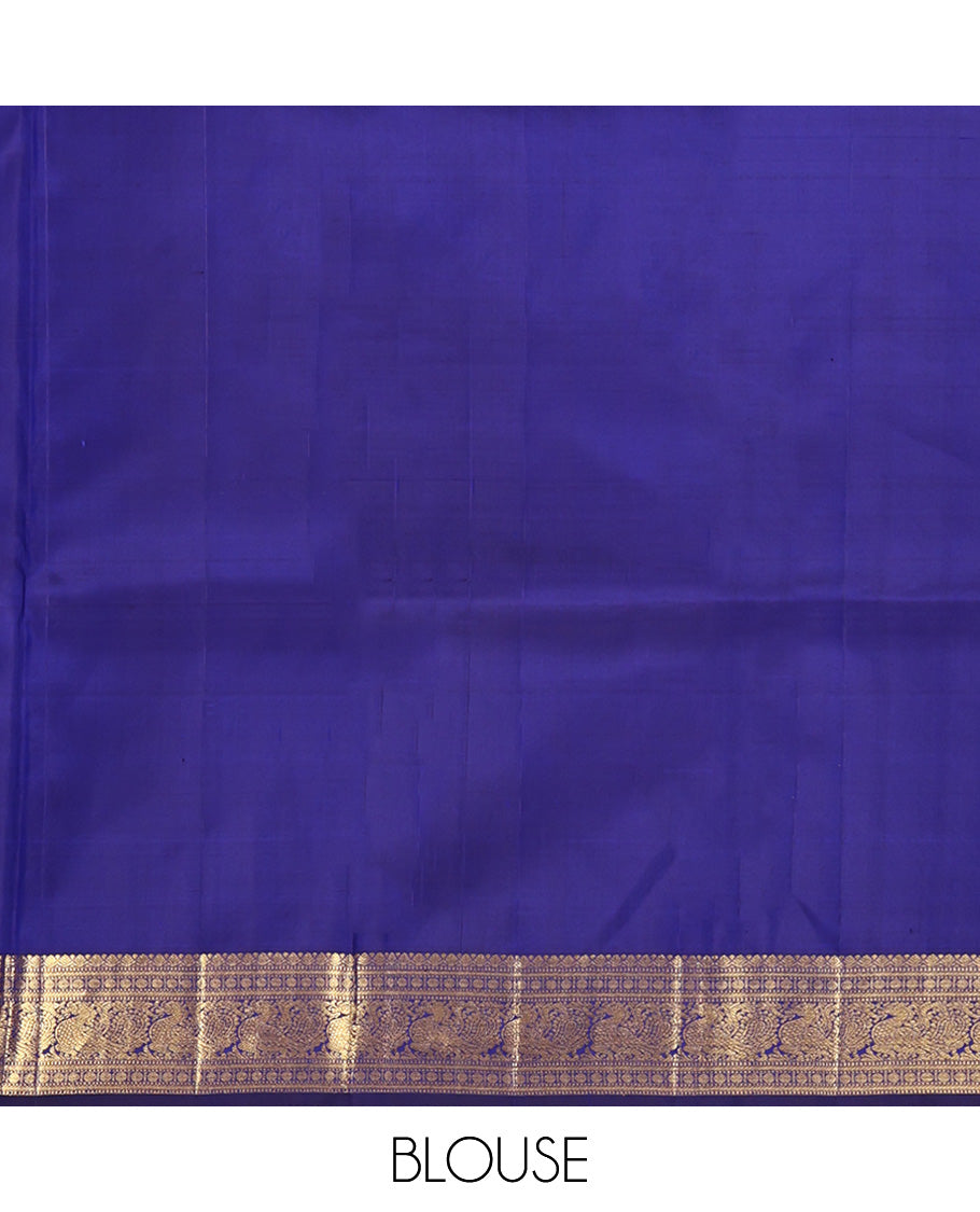 Blue Parampara Silk Saree, Graced with Zari Buttas and Embossed Texture On Its Body Highlighted by Zari Border of Muthu, Poun, and Mayil Designs, Pallu of Ara Maadam Designs, and Paired with a Matching Blouse