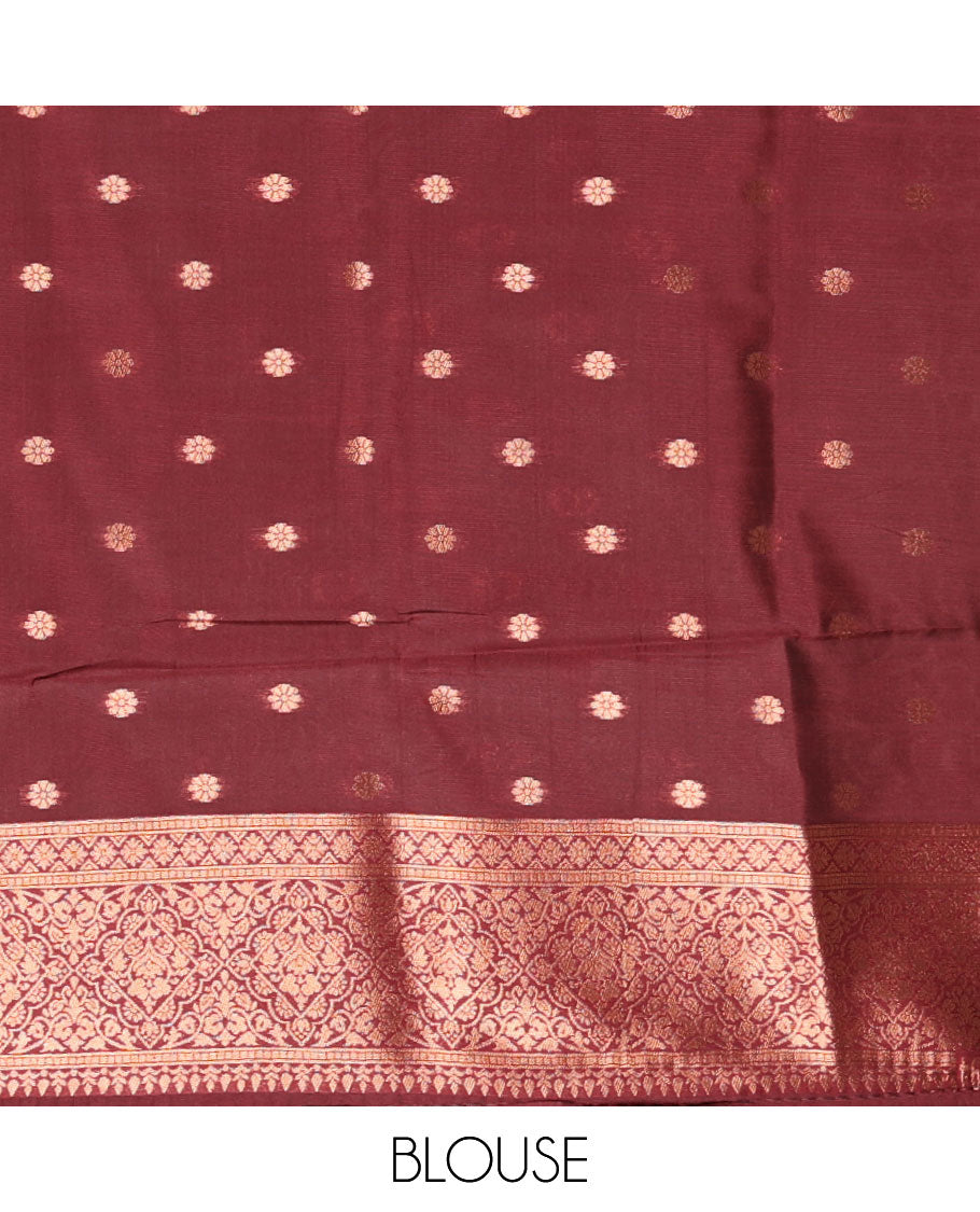Maroon jacquard kanchi tissue saree, zari chakram motifs border, intricately zari woven pallu, and a matching zari design blouse