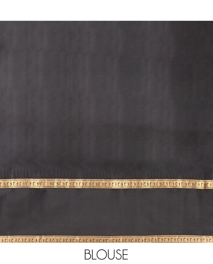 Green Vasundhara Silk Saree, Detailed with Zari Buttas on Its Body, Complemented by Contrast Temple Border of Banaras, Kathir, and Manga Designs, Grandly Woven Jaal Pallu, and Paired with a Contrast Blouse