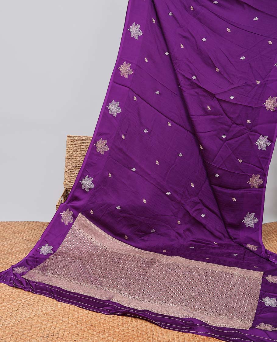Purple leaf motifs mushru silk saree with self floral design border & pallu of argyle design
