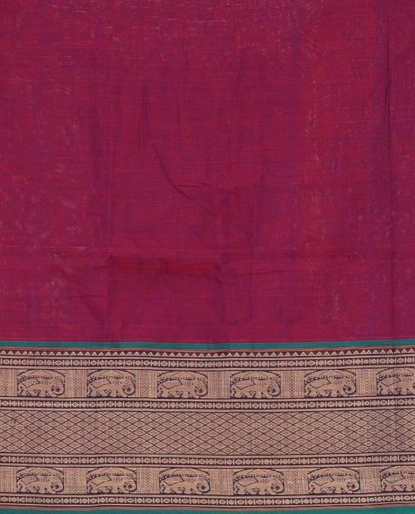 Purple with green cotton half saree with contrast elephant design border,elephant design blouse & zari design border dhavani