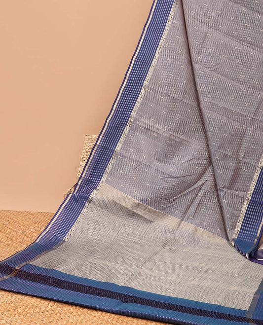 Grey checked vasundhara elite silk saree with contrast striped zari design border & intricate zari design pallu