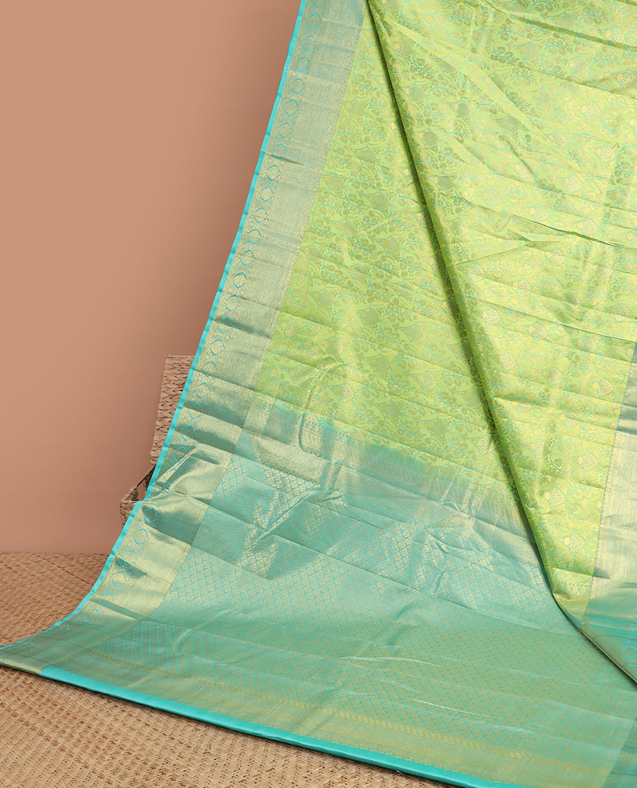Green floral jacquard kancheepuram silk saree with contrast zari design border & argyle design pallu