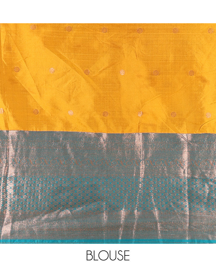 Mustard-rama taffeta half-saree, zari buttas with contrast traditional zari bordered skirt, a matching blouse, and contrast zari border dhavani with belt