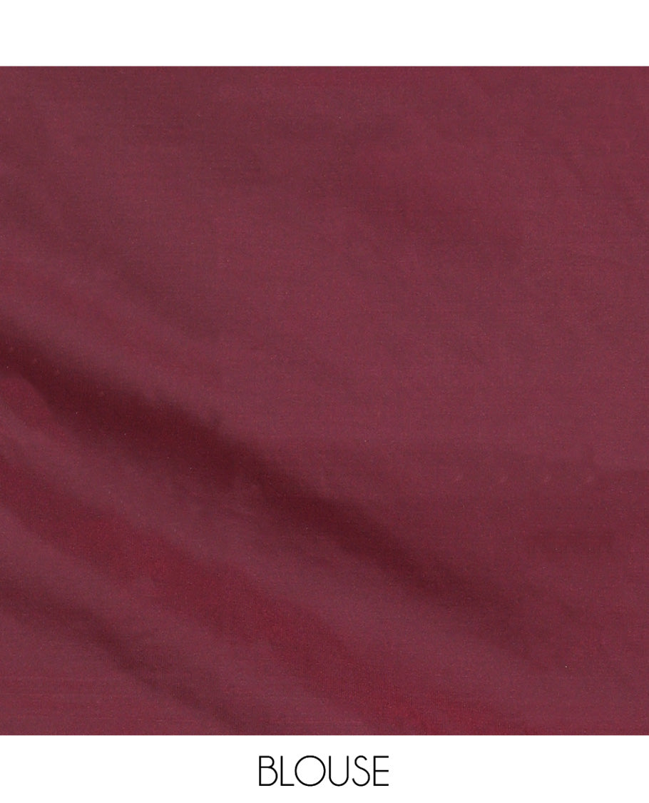 Maroon Semi-Banaras Silk Saree, Impeccably Detailed with Animal-themed Jacquard Designs on Its Body, Highlighted by a Zari Border of Traditional Designs, Pallu Steeped with Stripes, and Paired with a Matching Blouse