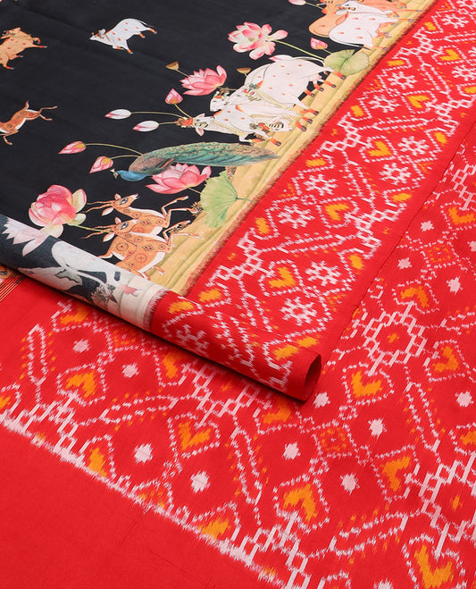 Black pichwai style design printed silk saree with contrast floral design & ikkat style floral design pallu