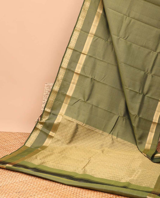 Green striped vasundhara elite silk saree with self intricate zari design border & jaal design pallu