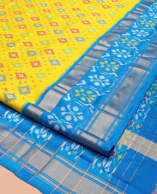 Yellow Ikkat Silk Saree, Bedecked with Meena Ikkat Buttas All Over Its Body, Complemented by a Contrast Border of Ikkat and Diamond Zari Designs, Pallu of Ogee Designs, and Paired with a Matching Blouse