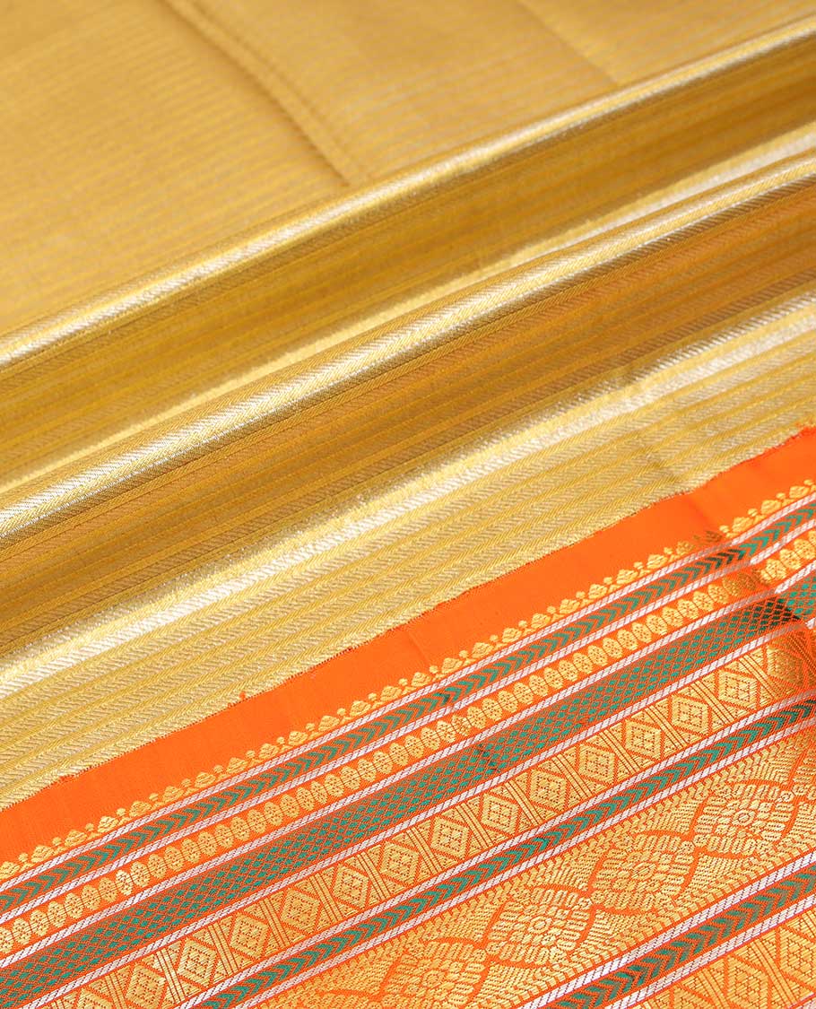 Light yellow striped silk half saree with contrast border of banaras, kathir, poo chakram, mayil design, zari design blouse & intricate zari design dhavani