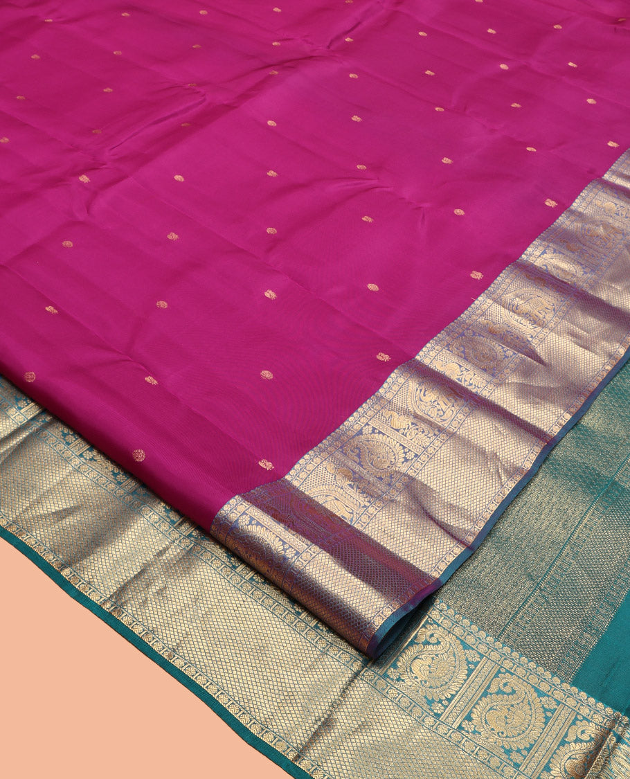 Magenta Vasundhara Lite Silk Mix Saree, Gleamed Up with Zari Buttas, a Contrast Border of Thilakam Mokku, Poun, Arumbu Manga, and Kuyil Kann, Grand Pallu, and a Contrast Blouse