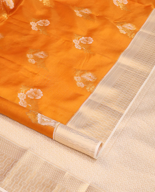 Orange floral design vasundhara elite silk saree with contrast zari design & intricate zari design pallu