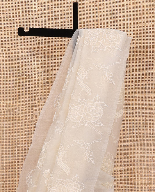 Borderless cream floral vine and bird motifs thread embroidered tissue saree, floral vine thread embroidered pallu
