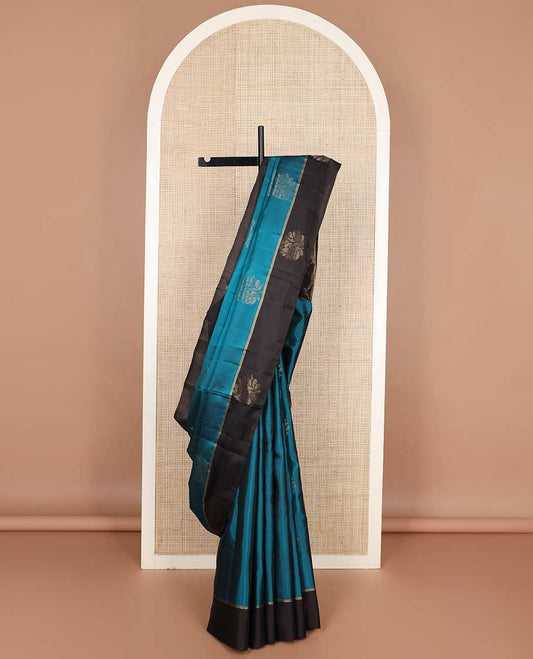 Blue zari buttas silk mix saree, contrast floral design border & pallu of geometric designs