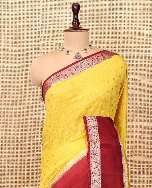 Yellow Assam Silk Saree, Finely Crafted with Zari Buttas, Complemented by Contrast Floral Creeper Zari Border, Striped Pallu, and Contrast Blouse