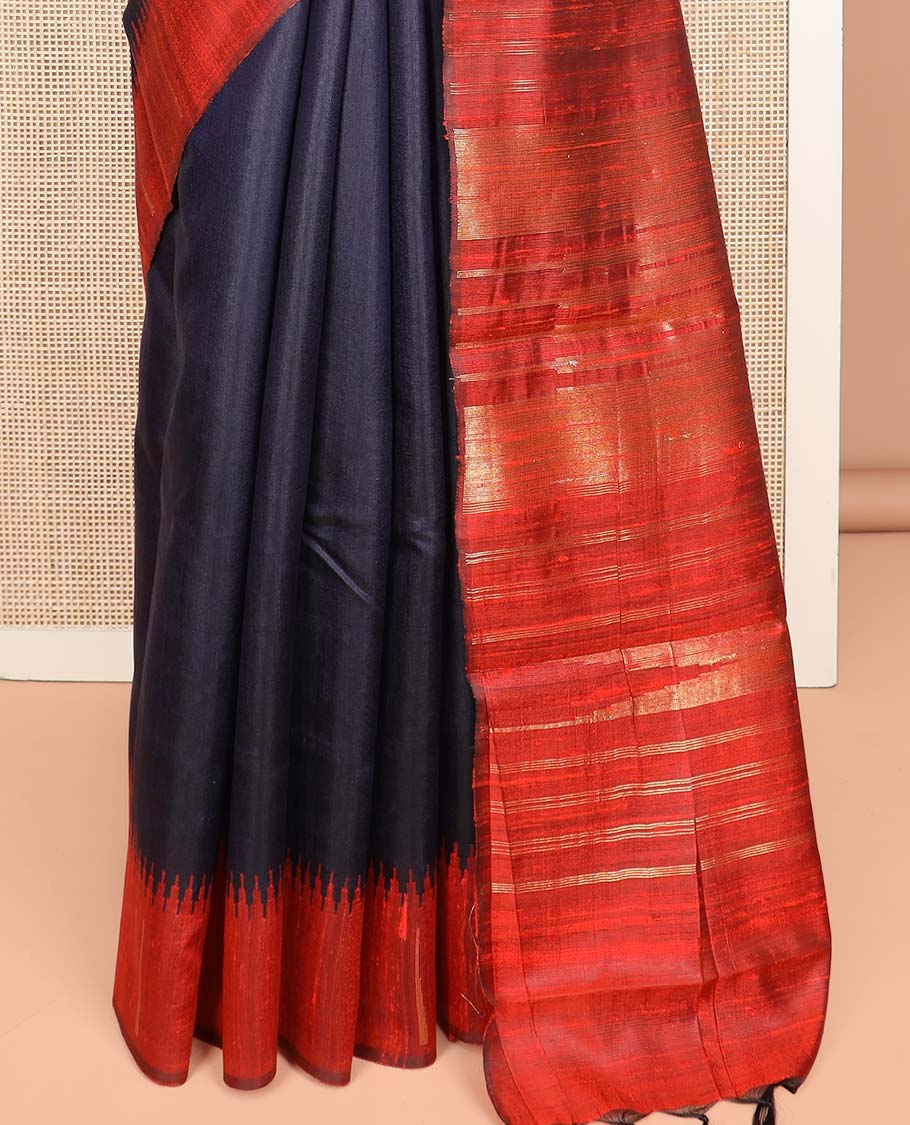 Navy Blue Plain Dupion Silk Saree, Complemented by a Contrast Temple Border, Gleaming Traditional Motifs Woven Pallu, and Paired with a Contrast Blouse