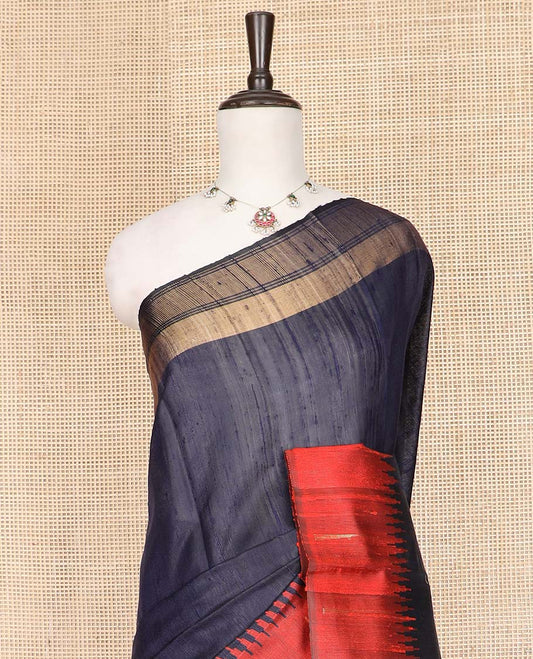 Navy Blue Plain Dupion Silk Saree, Complemented by a Contrast Temple Border, Gleaming Traditional Motifs Woven Pallu, and Paired with a Contrast Blouse