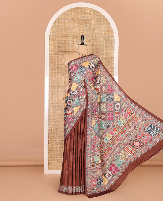 Brown colorful patterns printed and mirror work masakali saree, printed border, printed pallu, and a matching blouse