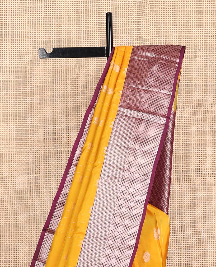 Yellow annam chakram buttas Vasundhara silk mix saree, contrast vanki & thilakam border & pallu of geometric designs
