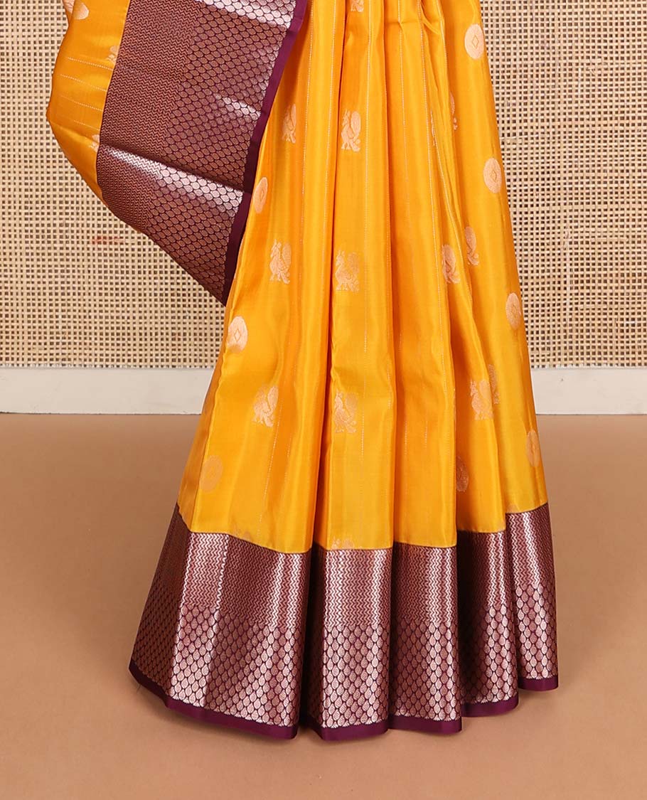 Yellow annam chakram buttas Vasundhara silk mix saree, contrast vanki & thilakam border & pallu of geometric designs