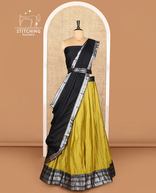 Green Art Silk Half-Saree Featuring Plain Skirt, Complemented by Contrast Traditional Zari Design Border, Paired with a Contrast Blouse, Contrast Zari-Bordered Dhavani, and Brocade Belt