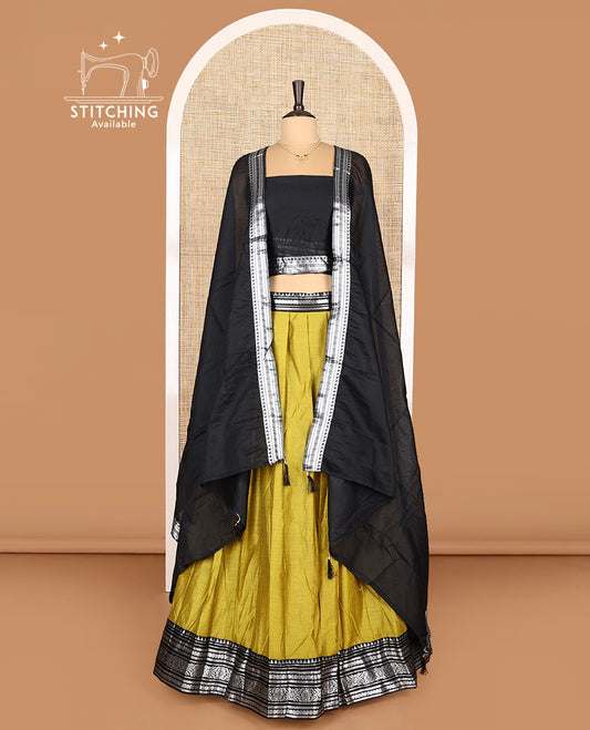 Green Art Silk Half-Saree Featuring Plain Skirt, Complemented by Contrast Traditional Zari Design Border, Paired with a Contrast Blouse, Contrast Zari-Bordered Dhavani, and Brocade Belt