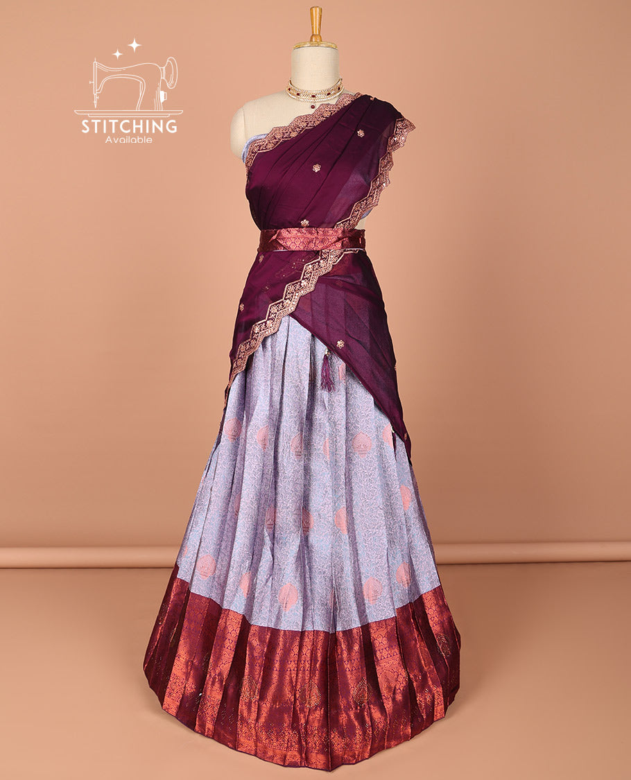 Blue floral design half saree with contrast zari border, zari design blouse & floral buttas, scallop border dhavani