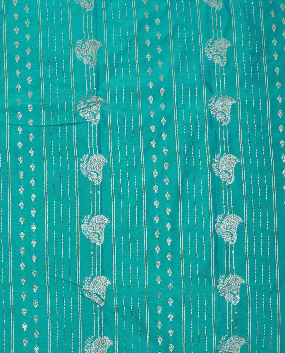 Green art silk pavadai material, zari design with contrast traditional zari bordered skirt, and a contrast bordered blouse