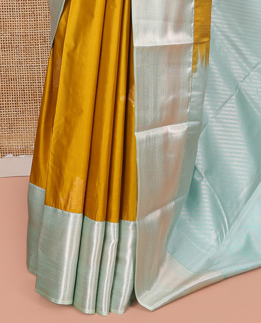 Yellow Budget Silk Saree, Delicately Woven with Zari Buttas on Its Body, Complemented by a Contrast Traditional Zari Design Border, Grand Diagonally Striped Pallu, and Paired with a Contrast Blouse