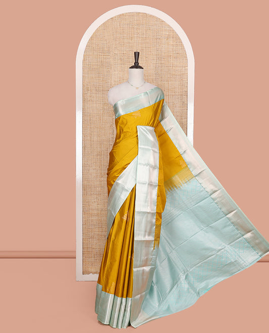 Yellow Budget Silk Saree, Delicately Woven with Zari Buttas on Its Body, Complemented by a Contrast Traditional Zari Design Border, Grand Diagonally Striped Pallu, and Paired with a Contrast Blouse