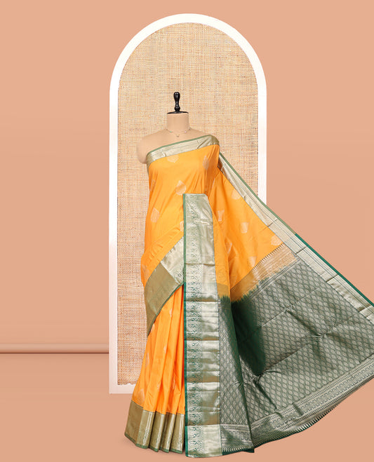 Yellow Budget Silk Saree, Subtly Sparkled with Zari Buttas, Complemented by a Contrast Traditional Zari Border, Grand Jaal Pallu, and Contrast Blouse
