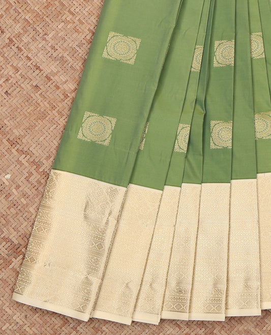 Green Budget Silk Saree, Bedecked with Zari Buttas All Over Its Body, Complemented by a Contrast Traditional Zari Design-Woven Border, Delicately Woven Pallu, and Paired with a Contrast Blouse