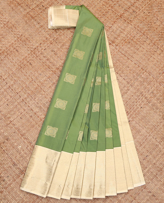Green Budget Silk Saree, Bedecked with Zari Buttas All Over Its Body, Complemented by a Contrast Traditional Zari Design-Woven Border, Delicately Woven Pallu, and Paired with a Contrast Blouse