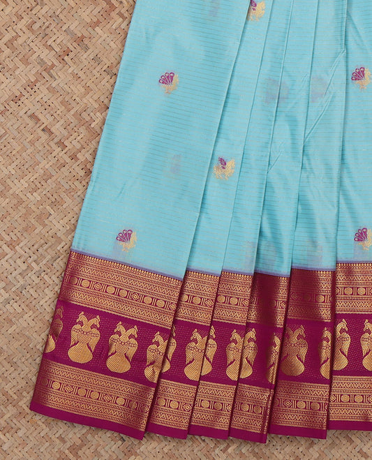 Blue Budget Silk Saree, Embelished with Horse Buttas and Stripes, a Contrast Iruthalai Pakshi Zari Border, a Jaal Pallu and a Contrast Blouse