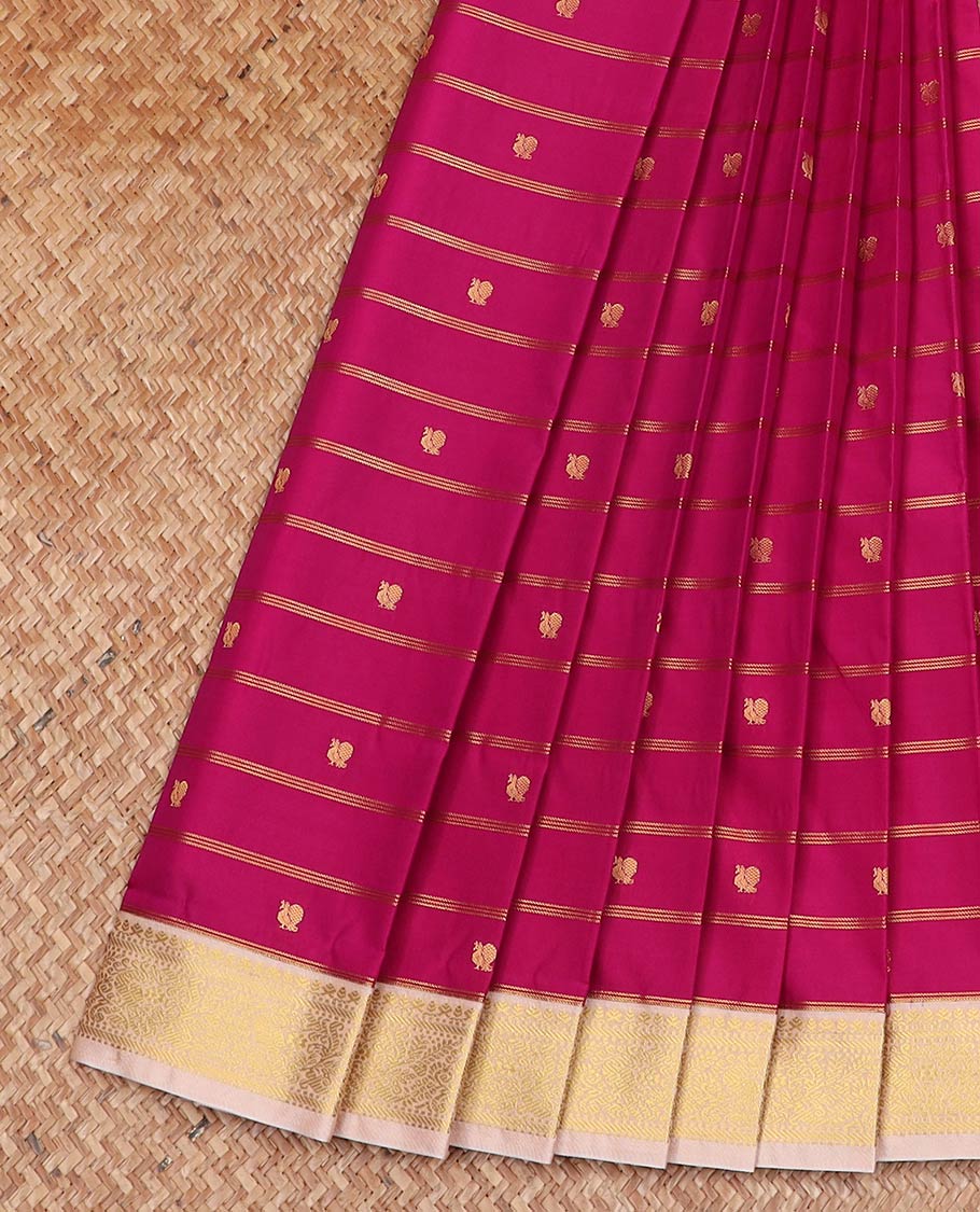 Rani pink striped and peacock buttas gift saree, contrast traditional zari border, and jaal pallu