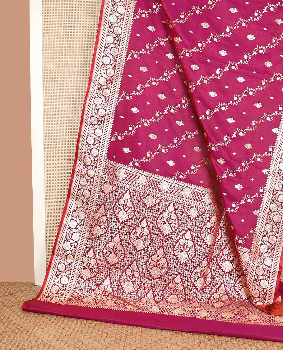 Magenta zari buttas banarasi silk saree, floral creeper design border, and intricate Mughal-style woven pallu