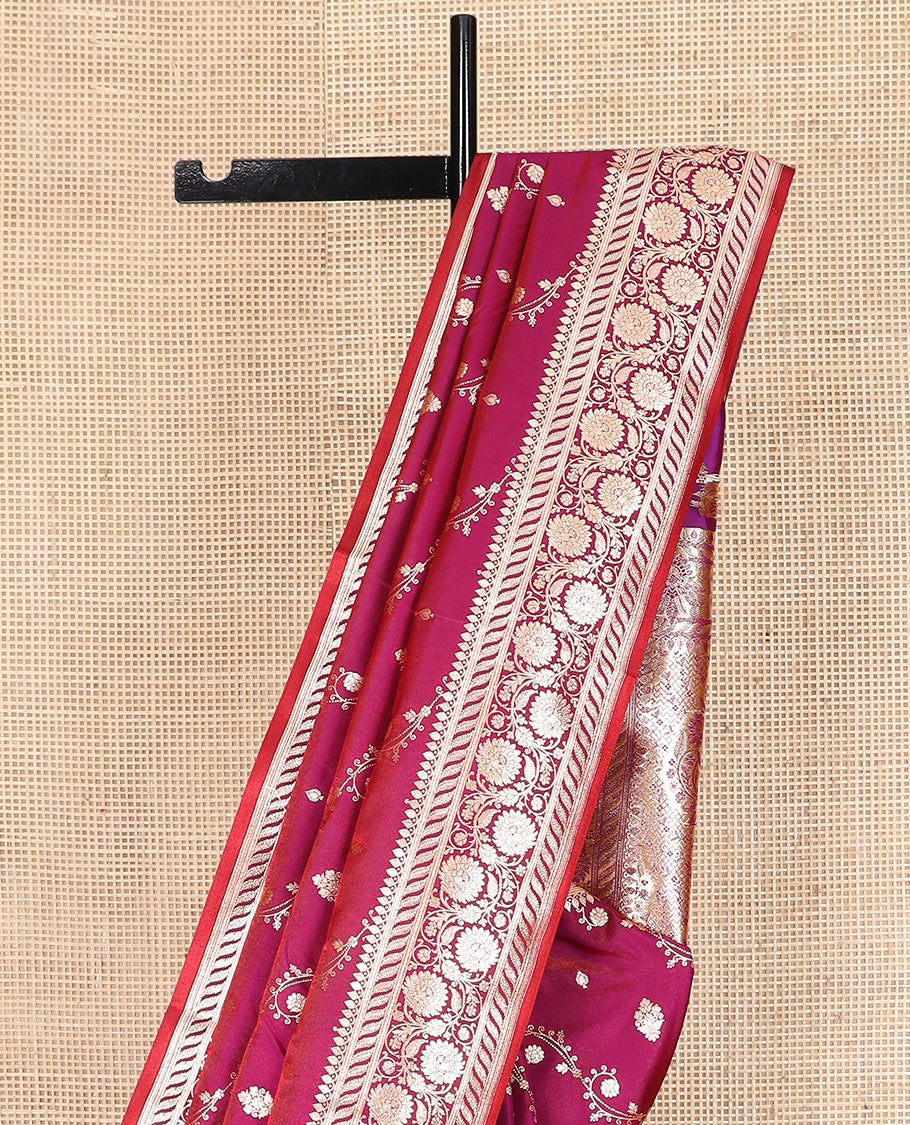 Magenta zari buttas banarasi silk saree, floral creeper design border, and intricate Mughal-style woven pallu