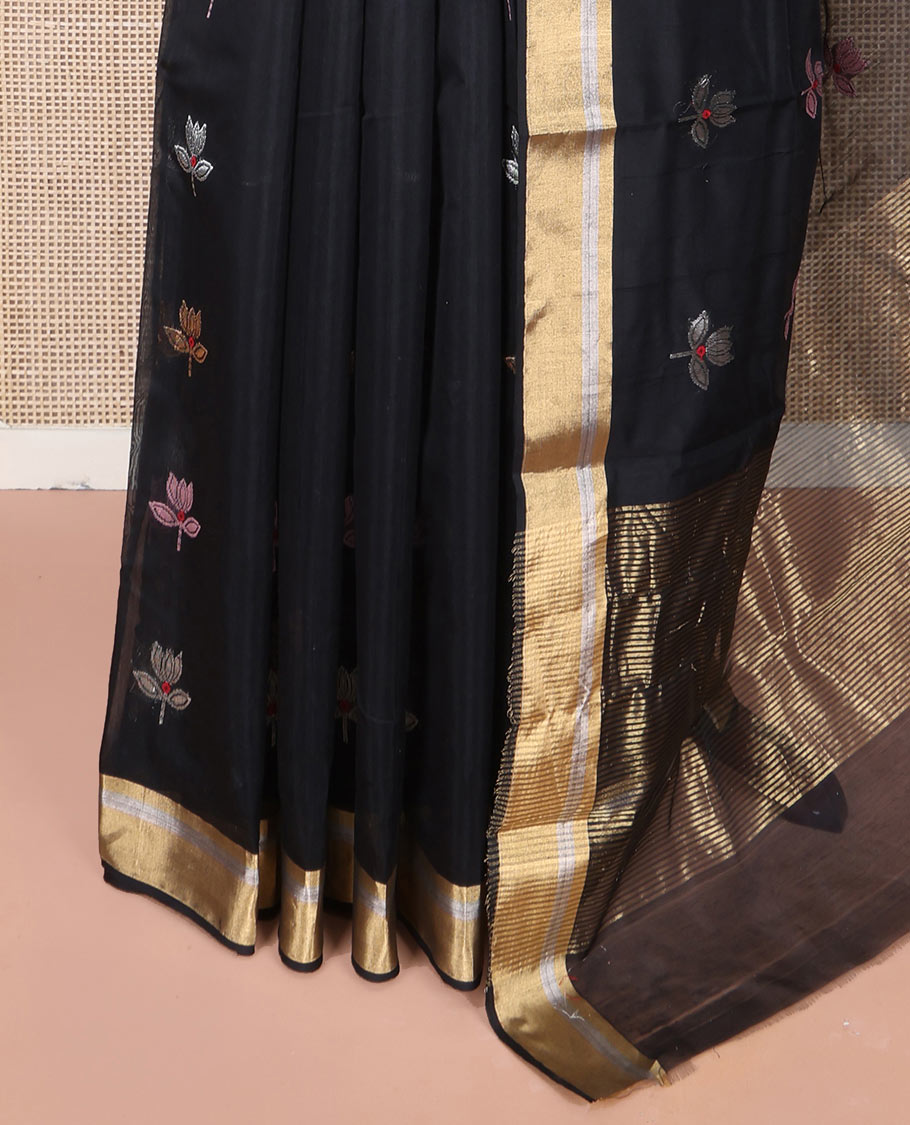 Black Chanderi Cotton Saree, Embellished with Floral Buttas All Over Its Body, Highlighted by Zari Border, Pallu Steeped with Zari Stripes, and Paired with a Matching Blouse