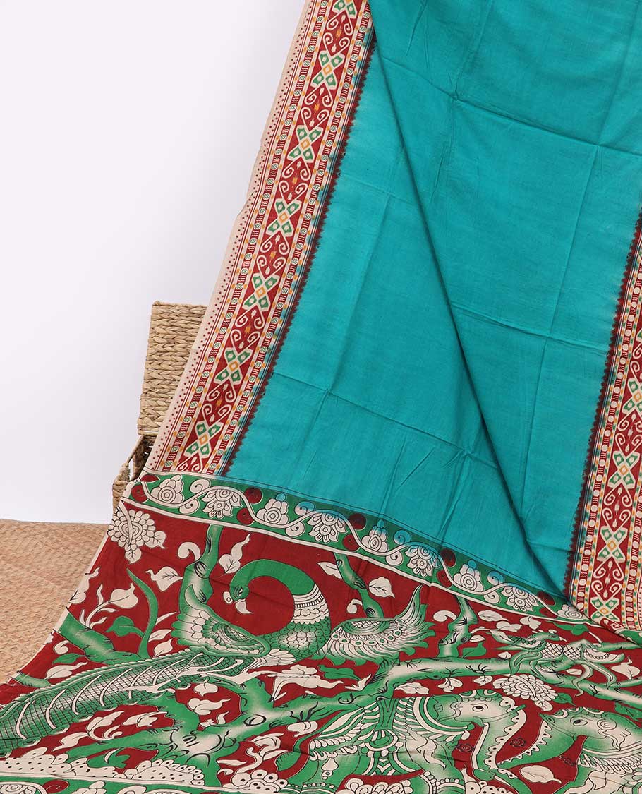 Blue machine-printed kalamkari cotton saree with contrast intricate design border & floral, peacock design pallu