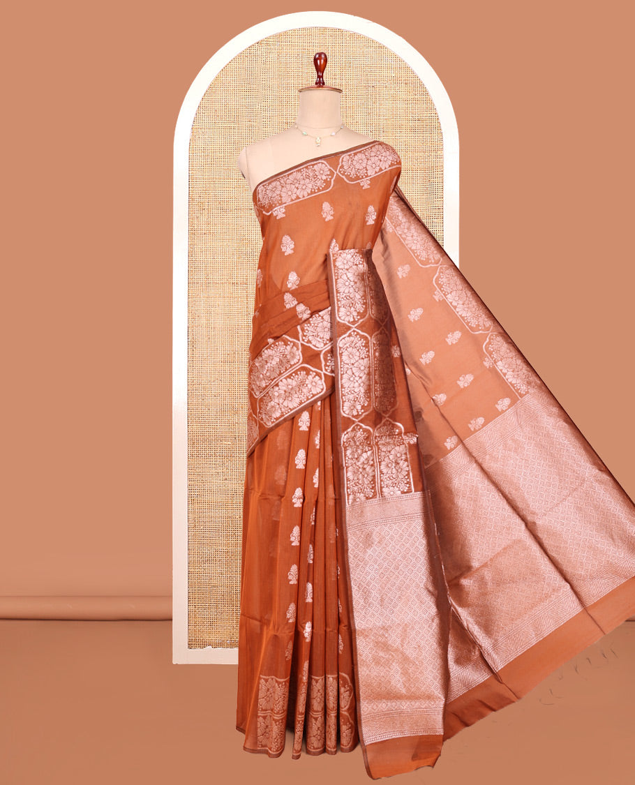 Rust Orange Semi-Silk Cotton Saree, Gleamed Up with Zari Buttas All Over Its Body, a Subtle Border of Floral Designs, Grand Jaal Pallu, and Paired with a Matching Blouse
