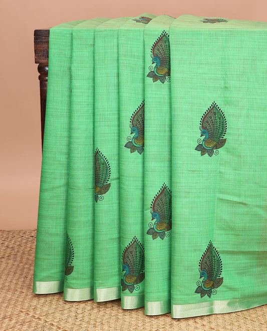 Green peacock buttas printed chirala cotton saree, bavanji border, and contrast floral motifs pallu