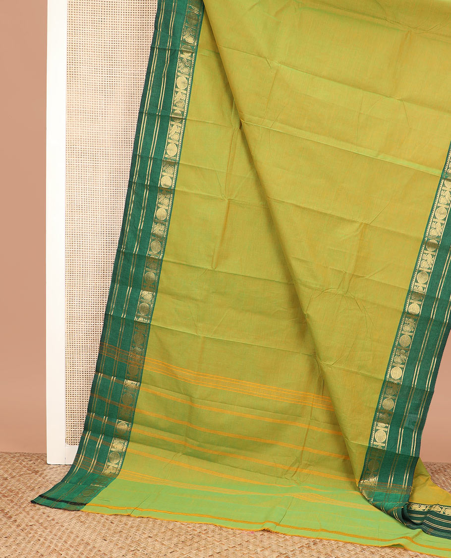 Green plain Chettinad cotton saree, contrast rettai pettu traditional zari border, and striped pallu