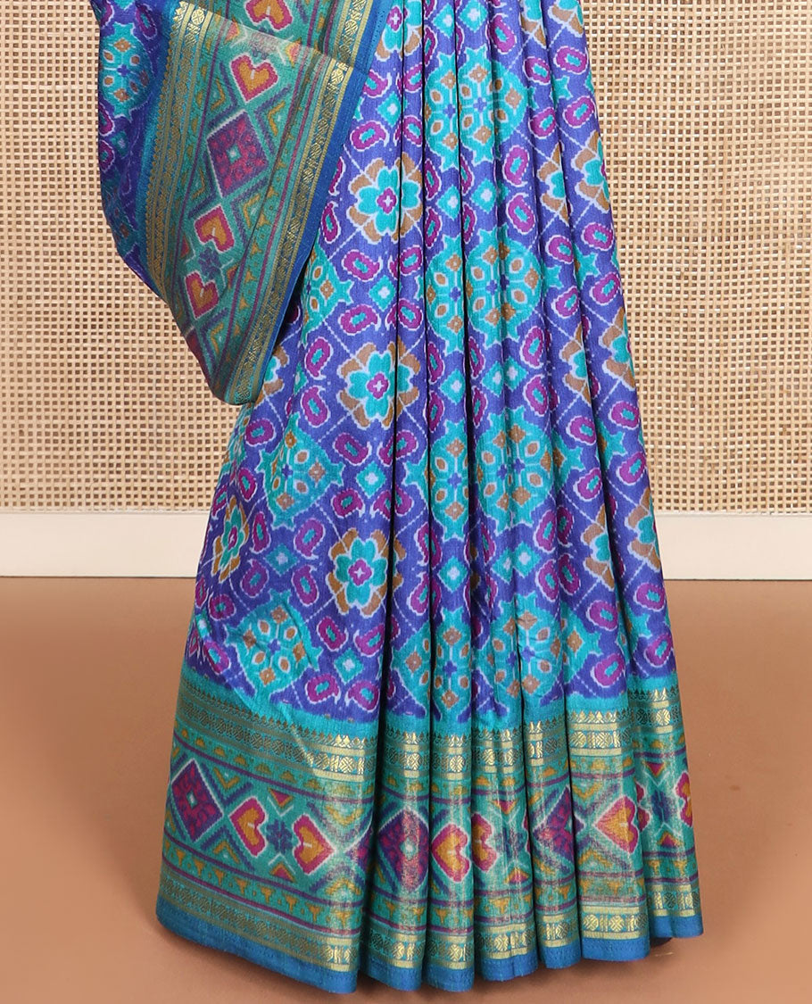 Blue ikkat design semi-banaras patola silk saree, traditional zari border of ikkat design, and ikkat design pallu