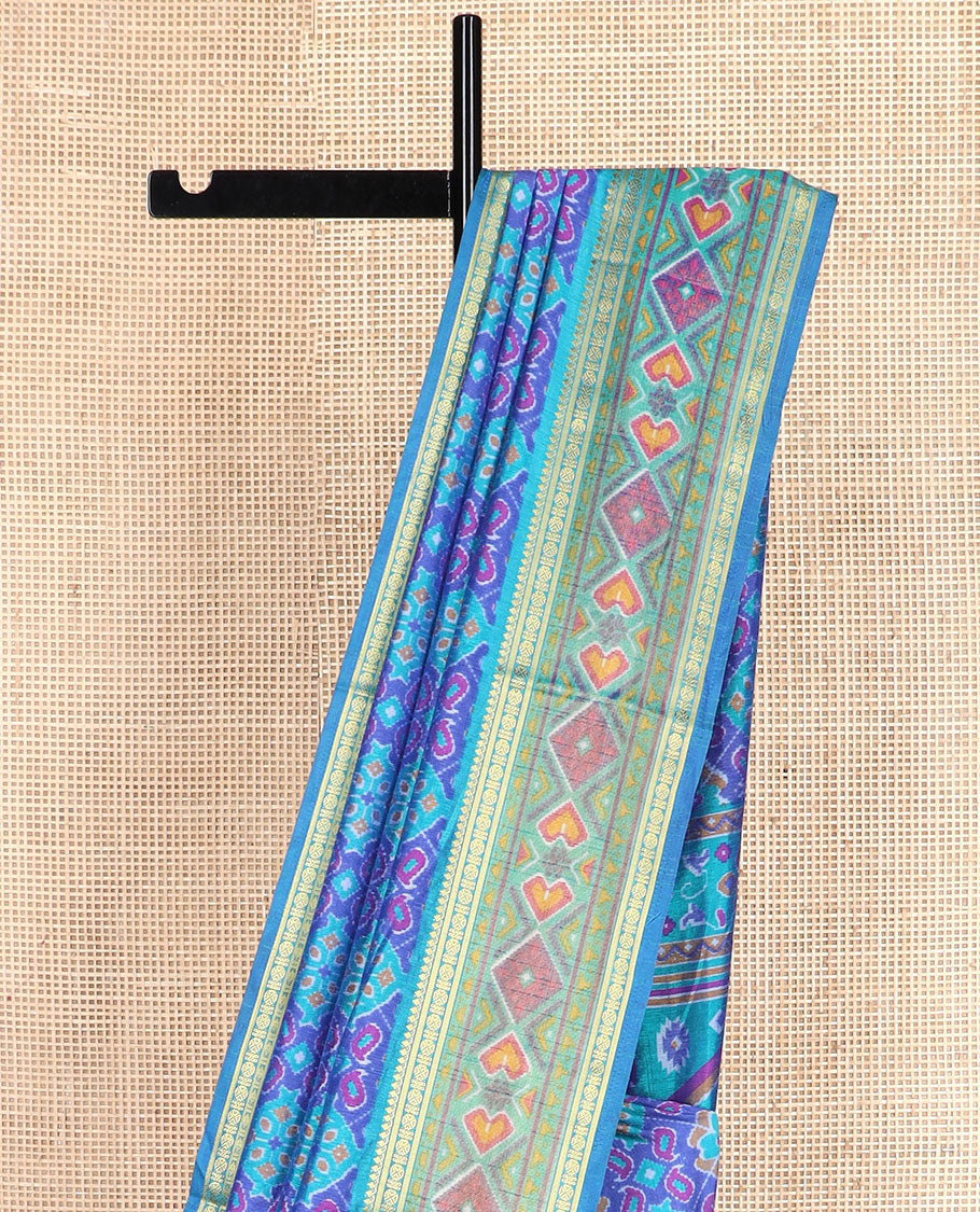 Blue ikkat design semi-banaras patola silk saree, traditional zari border of ikkat design, and ikkat design pallu