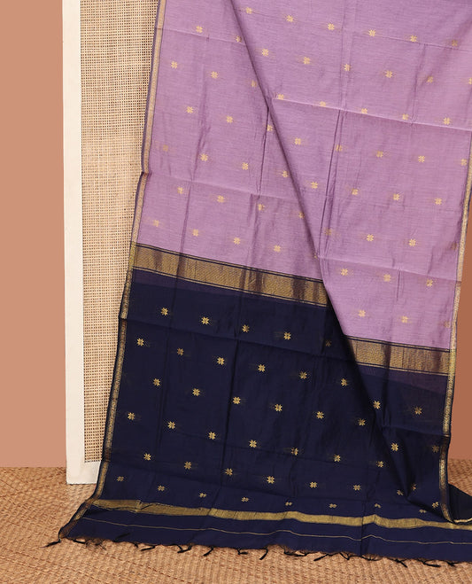 Lavender Maheshwari Cotton Saree, Decked up with Flower Buttas All Over Its Body, Subtly Woven Piping Border, Captivating Contrast Pallu Steeped with Buttas, and Paired with a Contrast Blouse