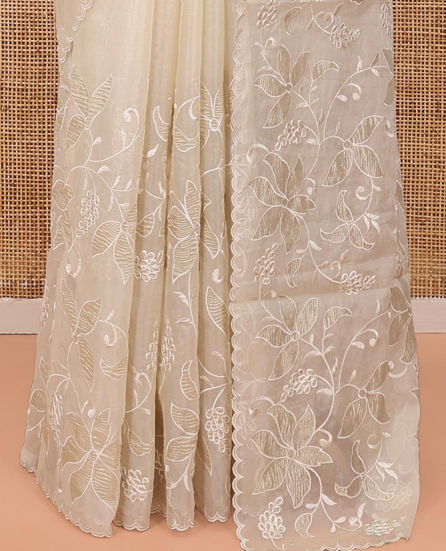 Beige Organza Saree, Finely Crafted with Floral Jaal Applique Embroidery All Over Its Body, Scallop Lace Border, Floral Embroidered Pallu, and Paired With a Embroidered Blouse