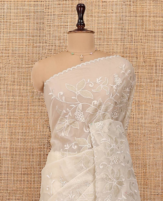 Beige Organza Saree, Finely Crafted with Floral Jaal Applique Embroidery All Over Its Body, Scallop Lace Border, Floral Embroidered Pallu, and Paired With a Embroidered Blouse