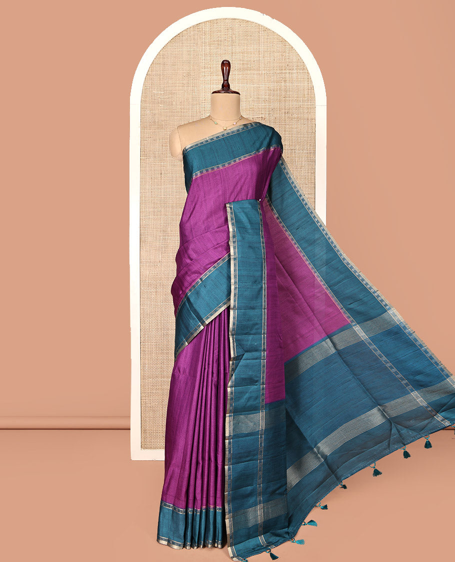 Purple Plain Semi-Tussar Silk Saree, Complemented by a Contrast Geometric Design Border, Subtly Zari Striped Pallu, and Paired with a Contrast Patola Printed Blouse