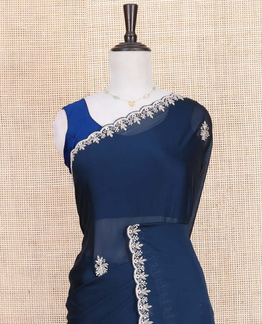 Blue Designer Saree, Mesmerized with Stone Embroidered Buttas on Its Body, Highlighted by Scallop Stone Work Border, Self-Pallu, and Paired with a Matching Embroidered Blouse