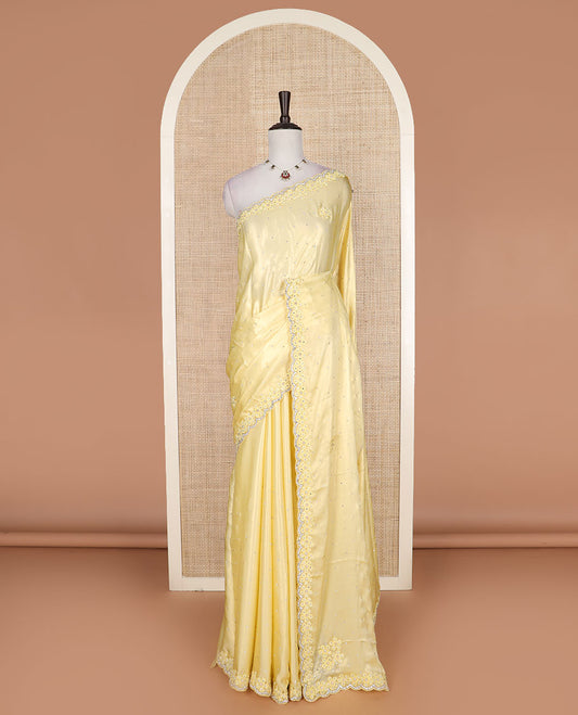 Yellow flower buttas embroidered with stone work designer saree, flower buttas embroidered with stone work scallop border